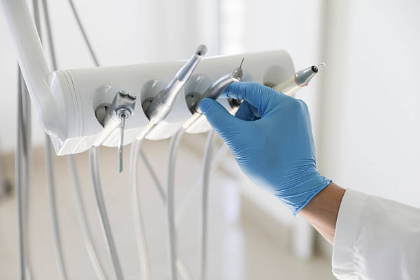 Professional Tooth Extraction technician working in Bay St. Louis, MS